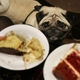 Pug looks up hopefully at cake on plate